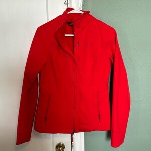 Woman’s zip up NorthFace jacket